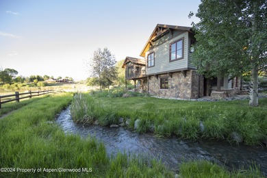 Light and bright mountain custom home with spectacular sunset on River Valley Ranch Golf Club in Colorado - for sale on GolfHomes.com, golf home, golf lot