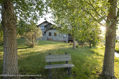 Light and bright mountain custom home with spectacular sunset on River Valley Ranch Golf Club in Colorado - for sale on GolfHomes.com, golf home, golf lot