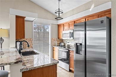 Welcome to the iconic Tan Tar A Estates, neighboring on The Oaks Golf Course in Missouri - for sale on GolfHomes.com, golf home, golf lot