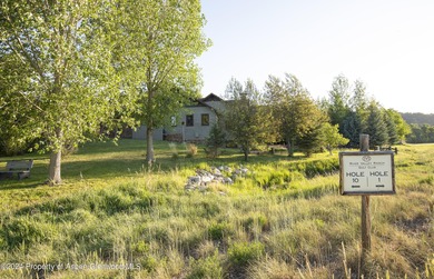 Light and bright mountain custom home with spectacular sunset on River Valley Ranch Golf Club in Colorado - for sale on GolfHomes.com, golf home, golf lot