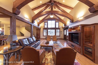 Light and bright mountain custom home with spectacular sunset on River Valley Ranch Golf Club in Colorado - for sale on GolfHomes.com, golf home, golf lot