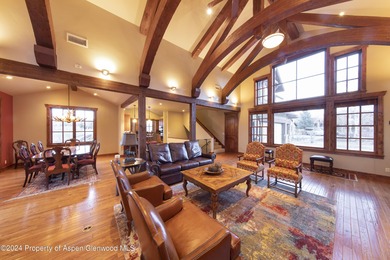 Light and bright mountain custom home with spectacular sunset on River Valley Ranch Golf Club in Colorado - for sale on GolfHomes.com, golf home, golf lot