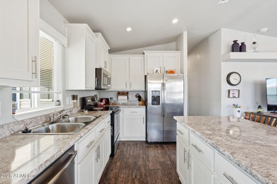 Welcome home to sunshine, space, and resort-style living! This on Augusta Ranch Golf Club in Arizona - for sale on GolfHomes.com, golf home, golf lot