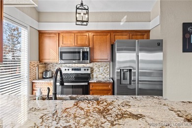 Welcome to the iconic Tan Tar A Estates, neighboring on The Oaks Golf Course in Missouri - for sale on GolfHomes.com, golf home, golf lot