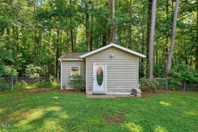 Another Lake Royale beauty with a backyard unlike any other! on River Golf and County Club at Lake Royale in North Carolina - for sale on GolfHomes.com, golf home, golf lot