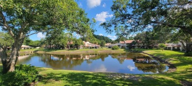 Pond View, spacious second floor furnished 2 bedroom, 2 bath on Tarpon Woods Golf Club in Florida - for sale on GolfHomes.com, golf home, golf lot
