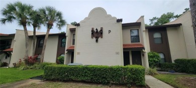 Pond View, spacious second floor furnished 2 bedroom, 2 bath on Tarpon Woods Golf Club in Florida - for sale on GolfHomes.com, golf home, golf lot