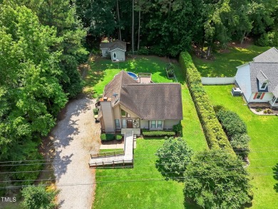 Another Lake Royale beauty with a backyard unlike any other! on River Golf and County Club at Lake Royale in North Carolina - for sale on GolfHomes.com, golf home, golf lot