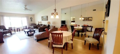 Pond View, spacious second floor furnished 2 bedroom, 2 bath on Tarpon Woods Golf Club in Florida - for sale on GolfHomes.com, golf home, golf lot