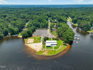 Another Lake Royale beauty with a backyard unlike any other! on River Golf and County Club at Lake Royale in North Carolina - for sale on GolfHomes.com, golf home, golf lot