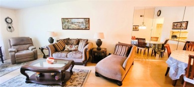 Pond View, spacious second floor furnished 2 bedroom, 2 bath on Tarpon Woods Golf Club in Florida - for sale on GolfHomes.com, golf home, golf lot
