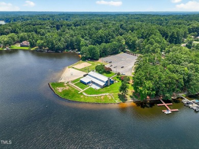 Another Lake Royale beauty with a backyard unlike any other! on River Golf and County Club at Lake Royale in North Carolina - for sale on GolfHomes.com, golf home, golf lot