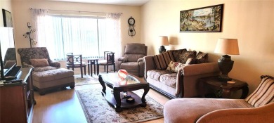 Pond View, spacious second floor furnished 2 bedroom, 2 bath on Tarpon Woods Golf Club in Florida - for sale on GolfHomes.com, golf home, golf lot