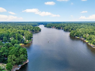 Another Lake Royale beauty with a backyard unlike any other! on River Golf and County Club at Lake Royale in North Carolina - for sale on GolfHomes.com, golf home, golf lot