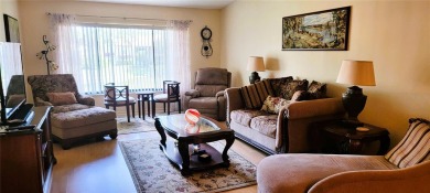 Pond View, spacious second floor furnished 2 bedroom, 2 bath on Tarpon Woods Golf Club in Florida - for sale on GolfHomes.com, golf home, golf lot