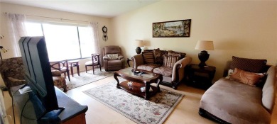 Pond View, spacious second floor furnished 2 bedroom, 2 bath on Tarpon Woods Golf Club in Florida - for sale on GolfHomes.com, golf home, golf lot