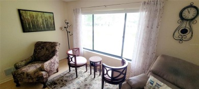 Pond View, spacious second floor furnished 2 bedroom, 2 bath on Tarpon Woods Golf Club in Florida - for sale on GolfHomes.com, golf home, golf lot