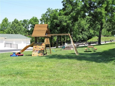 Build your lake dream on this beautiful .34-acre lot located in on Bear Creek Valley Golf Club in Missouri - for sale on GolfHomes.com, golf home, golf lot