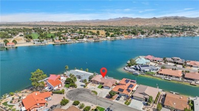 EXQUISITE LAKEFRONT PROPERTY with breathtaking views! This home on Silver Lakes Golf Course in California - for sale on GolfHomes.com, golf home, golf lot