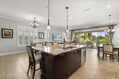 Perched along the rolling greens of the Jack Nicklaus-designed on Reunion Resort Golf Course in Florida - for sale on GolfHomes.com, golf home, golf lot
