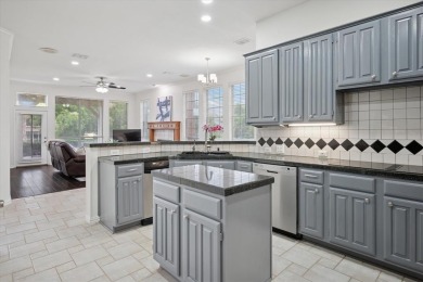 Situated on an oversized waterfront lot within the zero lot line on Hackberry Creek Country Club in Texas - for sale on GolfHomes.com, golf home, golf lot