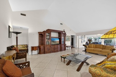 Enjoy South Florida living from this lovely Divosta-built home! on Bear Lakes Country Club in Florida - for sale on GolfHomes.com, golf home, golf lot