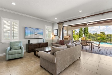 Perched along the rolling greens of the Jack Nicklaus-designed on Reunion Resort Golf Course in Florida - for sale on GolfHomes.com, golf home, golf lot