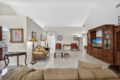 Enjoy South Florida living from this lovely Divosta-built home! on Bear Lakes Country Club in Florida - for sale on GolfHomes.com, golf home, golf lot