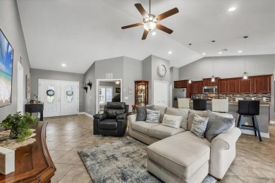 Welcome to this beautifully designed 3-bedroom, 2-bathroom home on Pinemoor West Golf Club in Florida - for sale on GolfHomes.com, golf home, golf lot