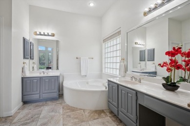 Situated on an oversized waterfront lot within the zero lot line on Hackberry Creek Country Club in Texas - for sale on GolfHomes.com, golf home, golf lot