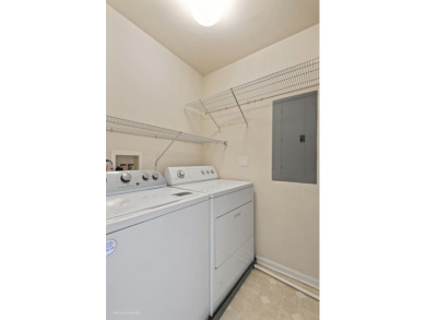 This lovely second floor condo in a secure building features 2 on The Links at Carillon in Illinois - for sale on GolfHomes.com, golf home, golf lot
