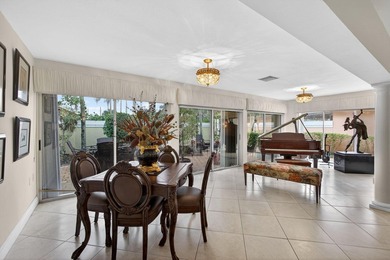 Enjoy South Florida living from this lovely Divosta-built home! on Bear Lakes Country Club in Florida - for sale on GolfHomes.com, golf home, golf lot