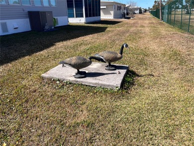 Welcome to resort-style living at Golf Lakes Residents Co-Op, a on Heather Hills Golf Course in Florida - for sale on GolfHomes.com, golf home, golf lot