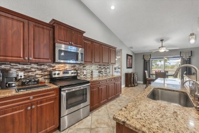 Welcome to this beautifully designed 3-bedroom, 2-bathroom home on Pinemoor West Golf Club in Florida - for sale on GolfHomes.com, golf home, golf lot