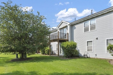 This lovely second floor condo in a secure building features 2 on The Links at Carillon in Illinois - for sale on GolfHomes.com, golf home, golf lot