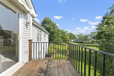 This lovely second floor condo in a secure building features 2 on The Links at Carillon in Illinois - for sale on GolfHomes.com, golf home, golf lot