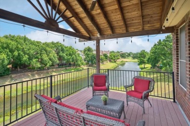 Situated on an oversized waterfront lot within the zero lot line on Hackberry Creek Country Club in Texas - for sale on GolfHomes.com, golf home, golf lot