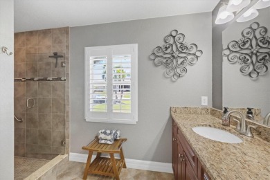 Welcome to this beautifully designed 3-bedroom, 2-bathroom home on Pinemoor West Golf Club in Florida - for sale on GolfHomes.com, golf home, golf lot