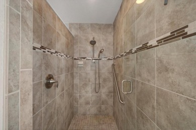 Welcome to this beautifully designed 3-bedroom, 2-bathroom home on Pinemoor West Golf Club in Florida - for sale on GolfHomes.com, golf home, golf lot
