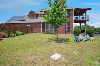 Situated on an oversized waterfront lot within the zero lot line on Hackberry Creek Country Club in Texas - for sale on GolfHomes.com, golf home, golf lot