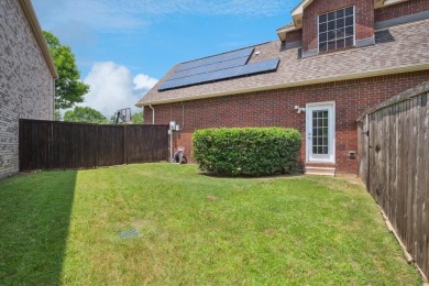 Situated on an oversized waterfront lot within the zero lot line on Hackberry Creek Country Club in Texas - for sale on GolfHomes.com, golf home, golf lot
