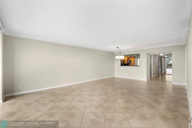 Experience the best of Florida living in this stunning home on Palm-Aire Country Club and Resort - Palms in Florida - for sale on GolfHomes.com, golf home, golf lot