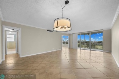 Experience the best of Florida living in this stunning home on Palm-Aire Country Club and Resort - Palms in Florida - for sale on GolfHomes.com, golf home, golf lot
