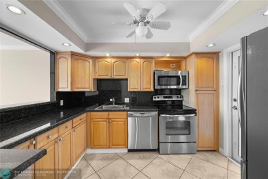 Experience the best of Florida living in this stunning home on Palm-Aire Country Club and Resort - Palms in Florida - for sale on GolfHomes.com, golf home, golf lot