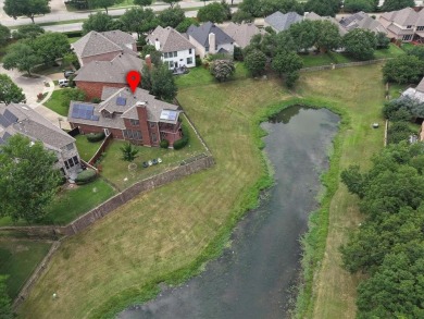 Situated on an oversized waterfront lot within the zero lot line on Hackberry Creek Country Club in Texas - for sale on GolfHomes.com, golf home, golf lot