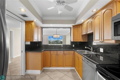 Experience the best of Florida living in this stunning home on Palm-Aire Country Club and Resort - Palms in Florida - for sale on GolfHomes.com, golf home, golf lot