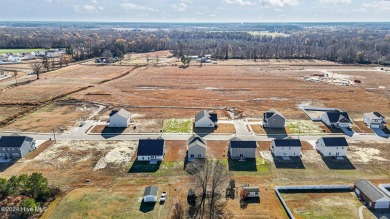 What a find! This four-bedroom, new construction home gives you on Ayden Golf and Country Club in North Carolina - for sale on GolfHomes.com, golf home, golf lot