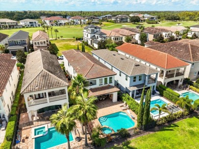 Perched along the rolling greens of the Jack Nicklaus-designed on Reunion Resort Golf Course in Florida - for sale on GolfHomes.com, golf home, golf lot