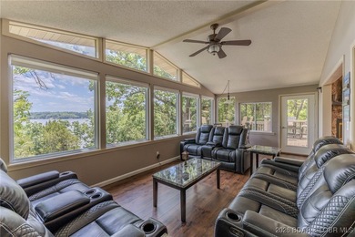 Located in the iconic Tan Tar A Estates, just steps from on The Oaks Golf Course in Missouri - for sale on GolfHomes.com, golf home, golf lot