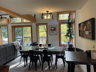 Discover this delightful end-unit townhouse, perfectly situated on Hermitage Club Golf Course in Vermont - for sale on GolfHomes.com, golf home, golf lot